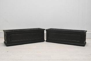 A pair of 19th century style faux lead planters, modern in fibreclay. H.18 W.50 D.16
