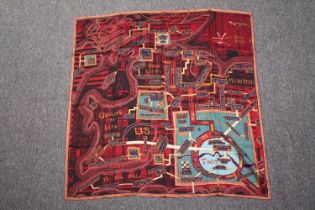 Grayson Perry, British, b.1960-, Red Carpet Scarf, 2017. A boxed hand rolled silk scarf in reds,