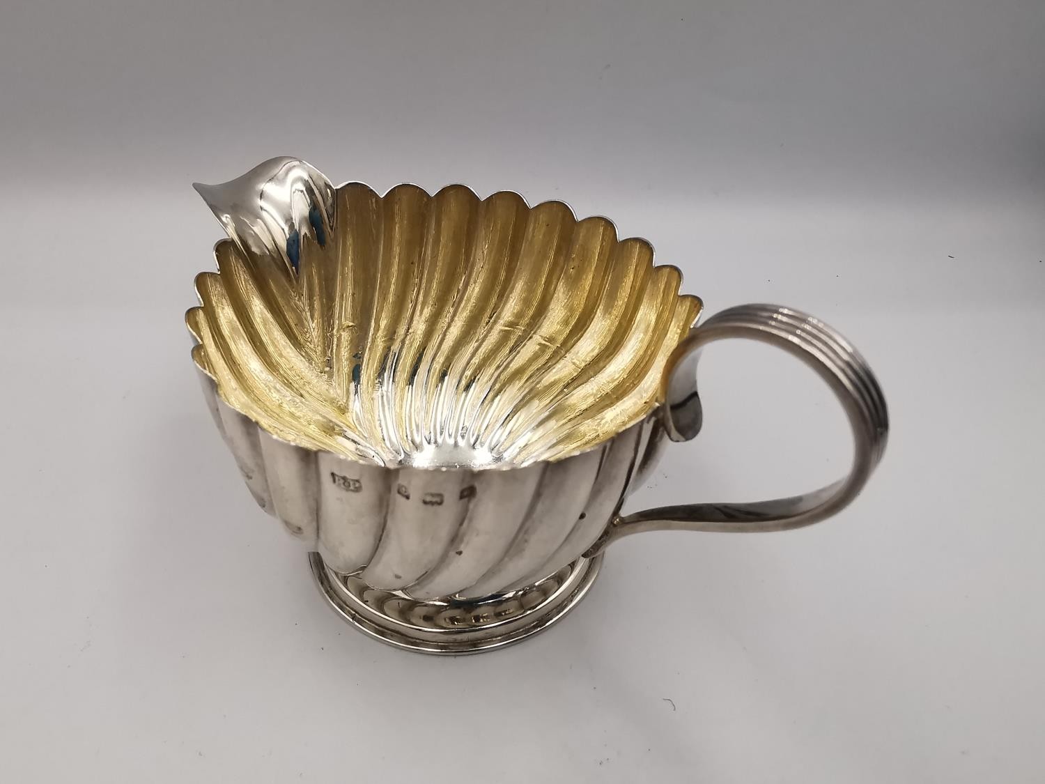 An Edwardian sterling silver sauce boat by Joseph Rodgers & Sons (handle broken) along with a - Image 11 of 14