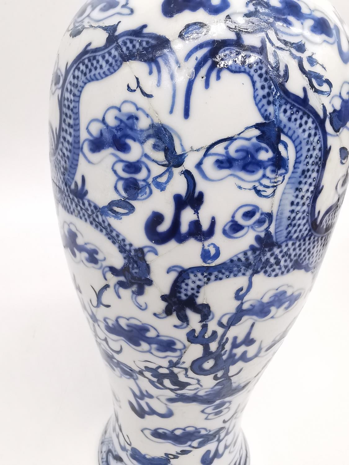 A pair of 19th century Chinese blue and white lidded dragon vases. Each vase decorated with four - Image 15 of 17