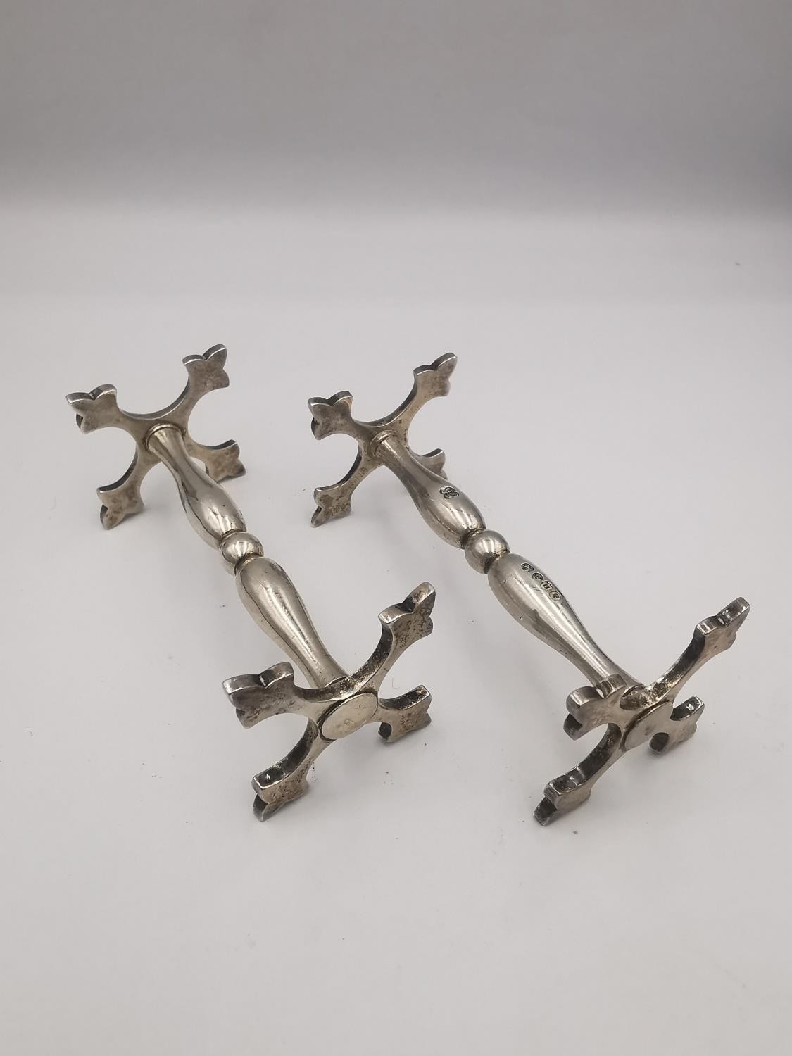 A collection of knife rests, a pair of Victorian silver knife rests with cross design ends by - Image 3 of 9