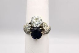 An Art Nouveau old mine diamond and sapphire two stone yellow (18ct gold) and white metal (platinum)