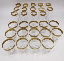 Two sets of fourteen Theresienthal Mintonborte Crystal drinking glasses with 24 carat gilded