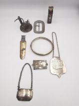 A collection of silver and silver plate items, including two silver drinks labels, a limited edition