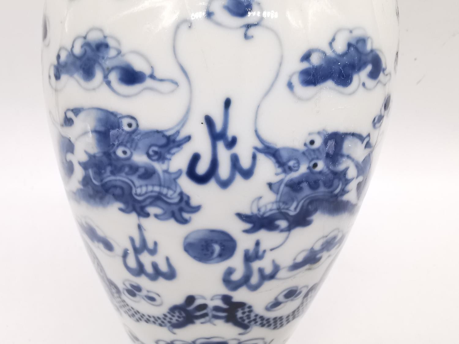 A pair of 19th century Chinese blue and white lidded dragon vases. Each vase decorated with four - Image 4 of 17