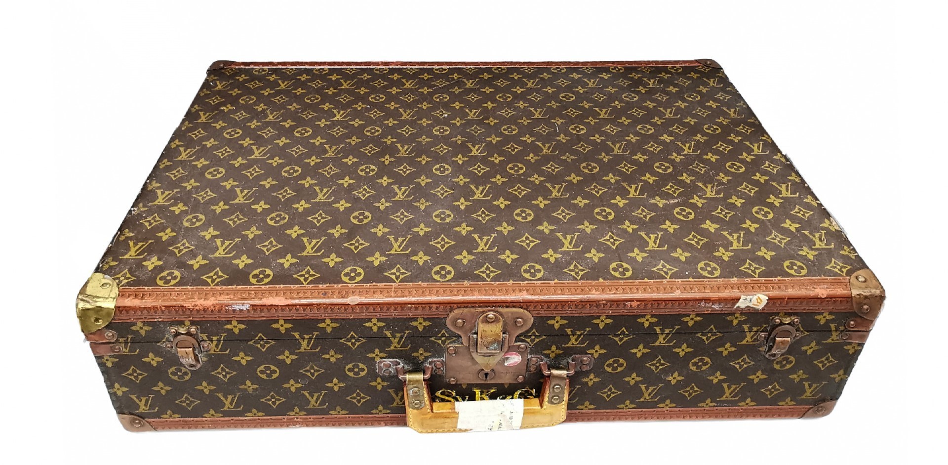 A French mid-20th century Louis Vuitton hard-sided case, the exterior finished in the famous