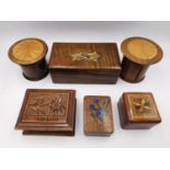 A collection of 19th and early 20th century treen stamp and trinket boxes, including one with