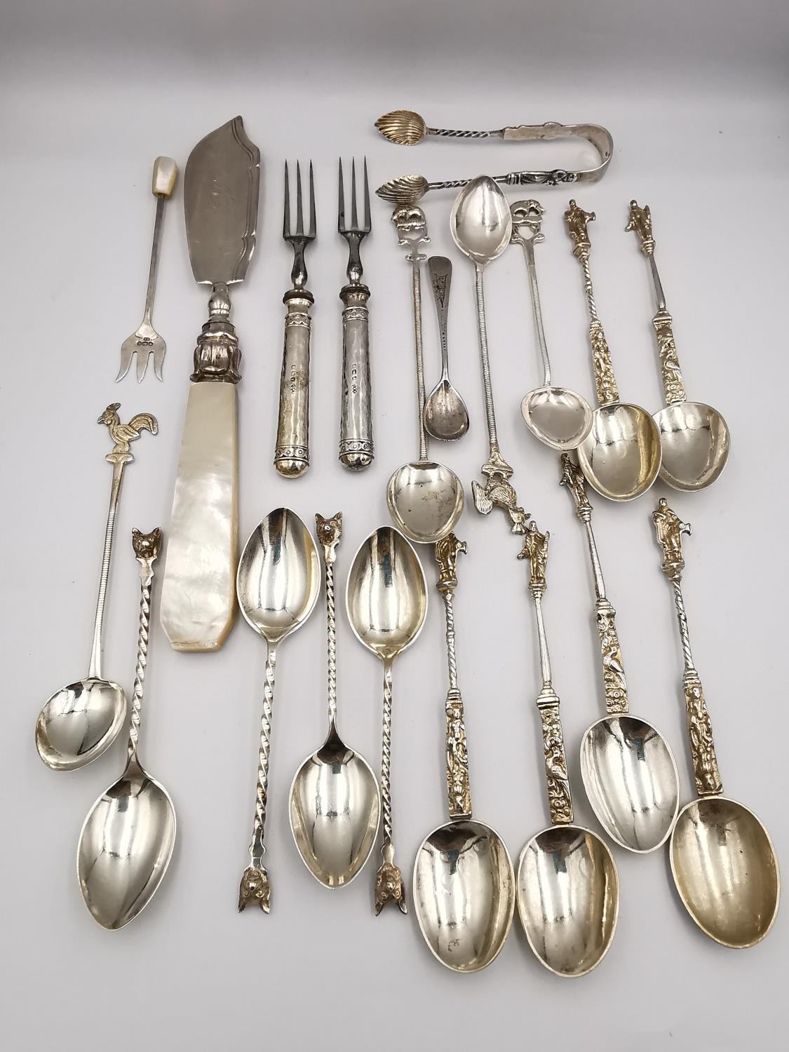 A collection of 19th and early 20th century silver and white metal cutlery, including a set of six