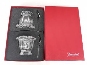 A boxed set of Baccarat crystal lidded mustard pots with spoons. All pieces stamped with makers