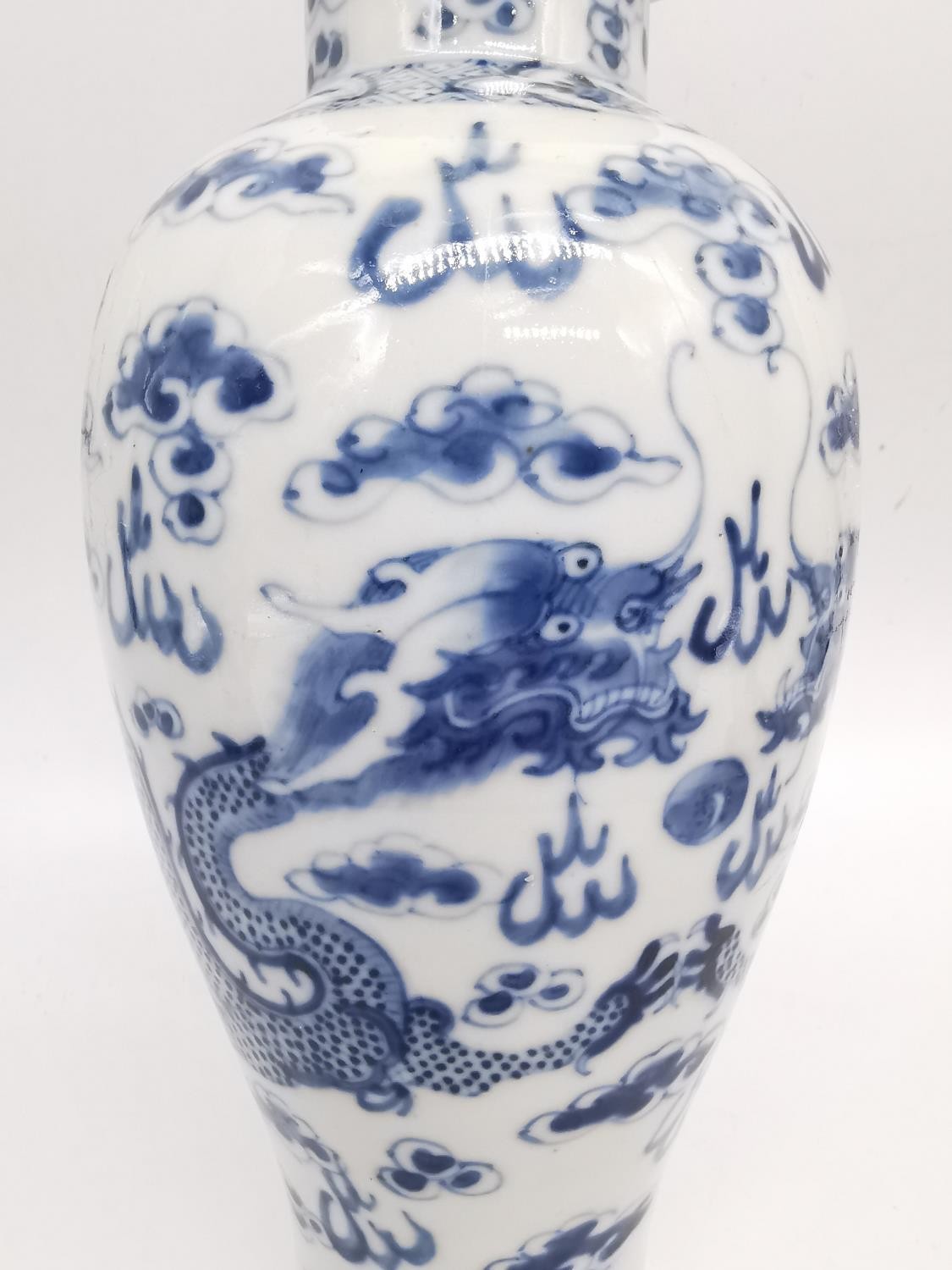 A pair of 19th century Chinese blue and white lidded dragon vases. Each vase decorated with four - Image 3 of 17