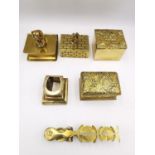 A collection of five 19th and early 20th century brass stamp boxes and a sovereign scale. The