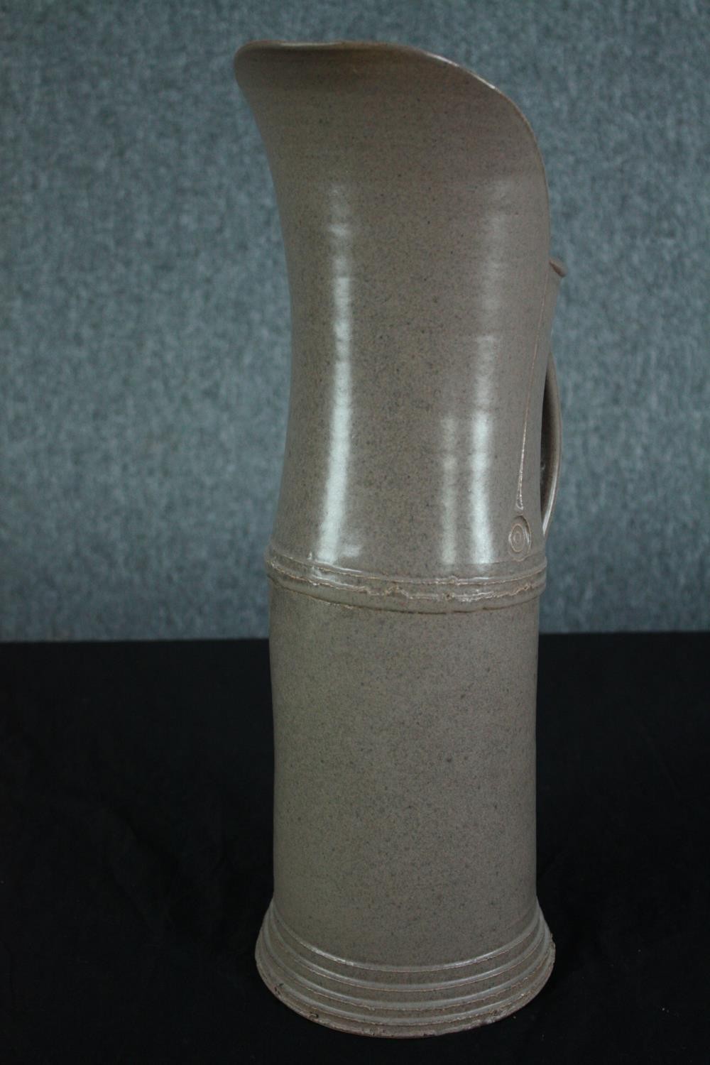 Walter Keeler, British, 1942-, a tall 'Articulated' salt-glaze stoneware jug, with applied strap - Image 2 of 6