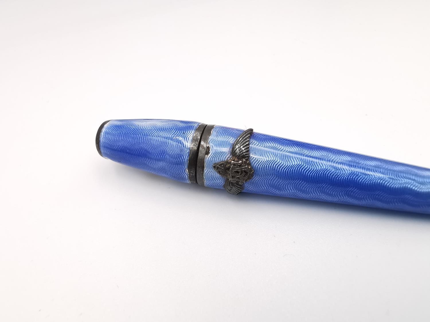 A cased blue guilloche enamel RAF sweet heart cheroot holder. The black plastic and silver - Image 2 of 9