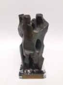 Merino Koldo, bronze sculpture of three embracing figures mounted on a black and white marble