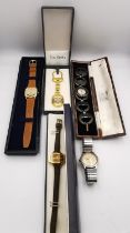 A collection of vintage watches and a boxed gilded silver Pierre Cardin keyring. Watches include a