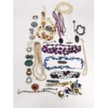 A collection of vintage jewellery, including an amethyst chips necklace with amethyst pendant, a