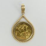 9ct gold pendant mount with a 1906 full sovereign, 9.8 grams. 44 mm long. UK Postage £12.