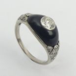 Platinum tested onyx and diamond (centre approx. 1/2ct) ring, 3.5 grams. Size M, 9.3 mm wide. UK