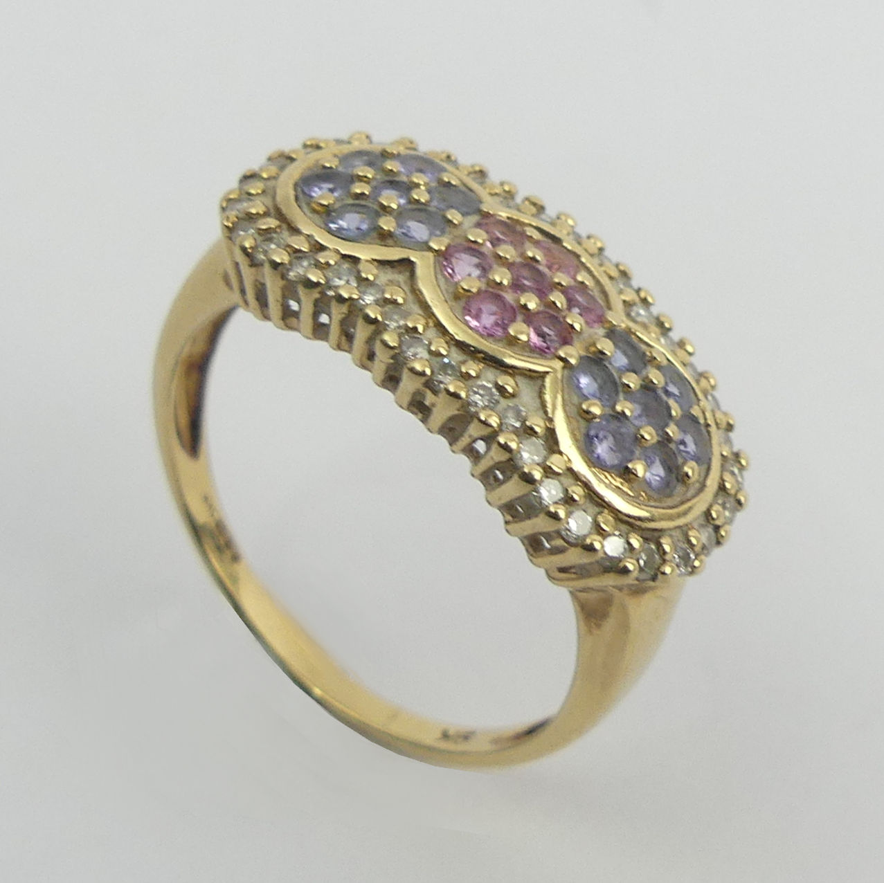 9ct gold ruby, tanzanite and diamond ring, 4 grams. Size T, 11.3 mm. UK Postage £12.