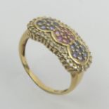 9ct gold ruby, tanzanite and diamond ring, 4 grams. Size T, 11.3 mm. UK Postage £12.