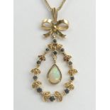 9ct gold sapphire and opal pendant and chain, 88 grams. Pendant 47 mm, chain 50 cm. UK Postage £12.