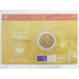 Elizabeth II 2002 uncirculated gold shield back commemorative sovereign. UK Postage £12.