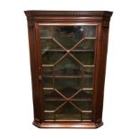 Georgian mahogany astral glazed corner hanging wall cupboard. 91 x 74 cm. Collection only.