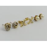 A pair of 18ct gold cross design diamond earrings, a pair of 9ct gold knot earrings and a pair of