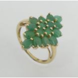 9ct gold emerald marquise form ring, 2.7 grams. Size N 1/2, 22.5 mm wide. UK Postage £12.