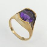 9ct gold tension set amethyst single stone ring, 5.7 grams. Size N 1/2 with reducers, 14.24 mm wide.
