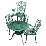 A green painted metal garden table and four matching chairs. Table 87 cm in diameter. Collection