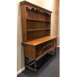 1920's oak Welsh dresser retailed by Jas Shoolbred. 158 wide x 51 deep x 192 cm high. Collection