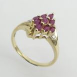 9ct gold ruby and diamond ring, 3.2 grams. Size S, 13.4 mm wide. UK Postage £12.