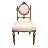 An ornate gilt wood salon chair. 41 x 82 cm. Collection only.