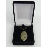 9ct gold reticulated quartz pendant and chain, 10.2 grams. Chain 65 cm, Pendant 44 mm. UK Postage £
