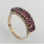 9ct rose gold pink tourmaline five stone ring, Chester 1888, 3.6 grams. Size Q 1/2, 6.4 mm wide.