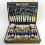 An oak canteen of Priestley silver plate cutlery, 42 pieces. UK Postage £16.