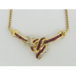 18ct gold ruby and diamond necklace, 9.2 grams. 45 cm long, centre 40 mm. Uk Postage £12.