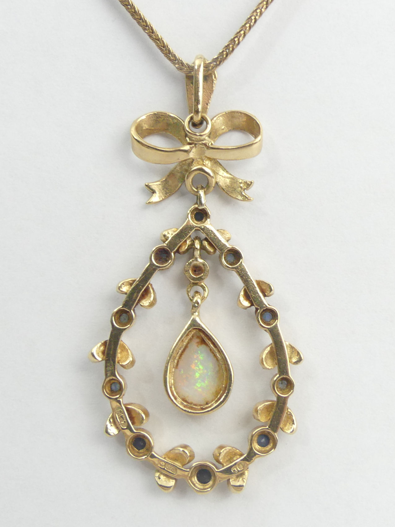 9ct gold sapphire and opal pendant and chain, 88 grams. Pendant 47 mm, chain 50 cm. UK Postage £12. - Image 4 of 5