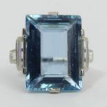 Platinum (tested) aquamarine (approx. 11cts) and diamond ring, 6.5 grams. Size I, 18 mm. UK