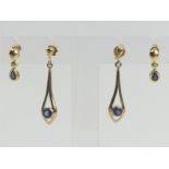 A pair of 18ct gold sapphire and diamond earrings and a pair of 9ct gold sapphire drop examples, 4.8