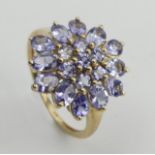 9ct gold tanzanite cluster ring, 2.6 grams. Size N 1/2, 17.3 grams. UK Postage £12.