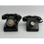 A black bakelite G.E.C. telephone and a black plastic example. UK Postage £18.