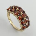 9ct gold garnet two row ring, 3.6 grams. Size N 1/2, 8.5 mm. UK Postage £12.
