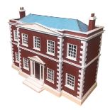 A large dolls house with a fittted interior and furniture. Postage not available.