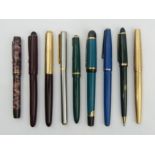 Nine old Parker and other pens. UK Postage £12.