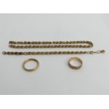 Two 9ct gold wedding rings and a part 9ct gold necklace, 18.4 grams. Sizes R & P 1/2. UK Postage £