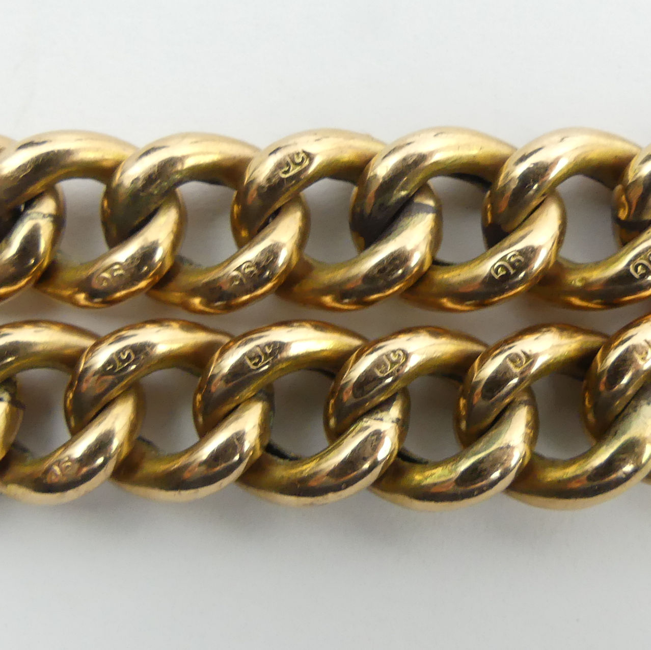 9ct gold textured and plain curb link gate bracelet, 18.6 grams. 10 mm wide. UK Postage £12. - Image 2 of 3