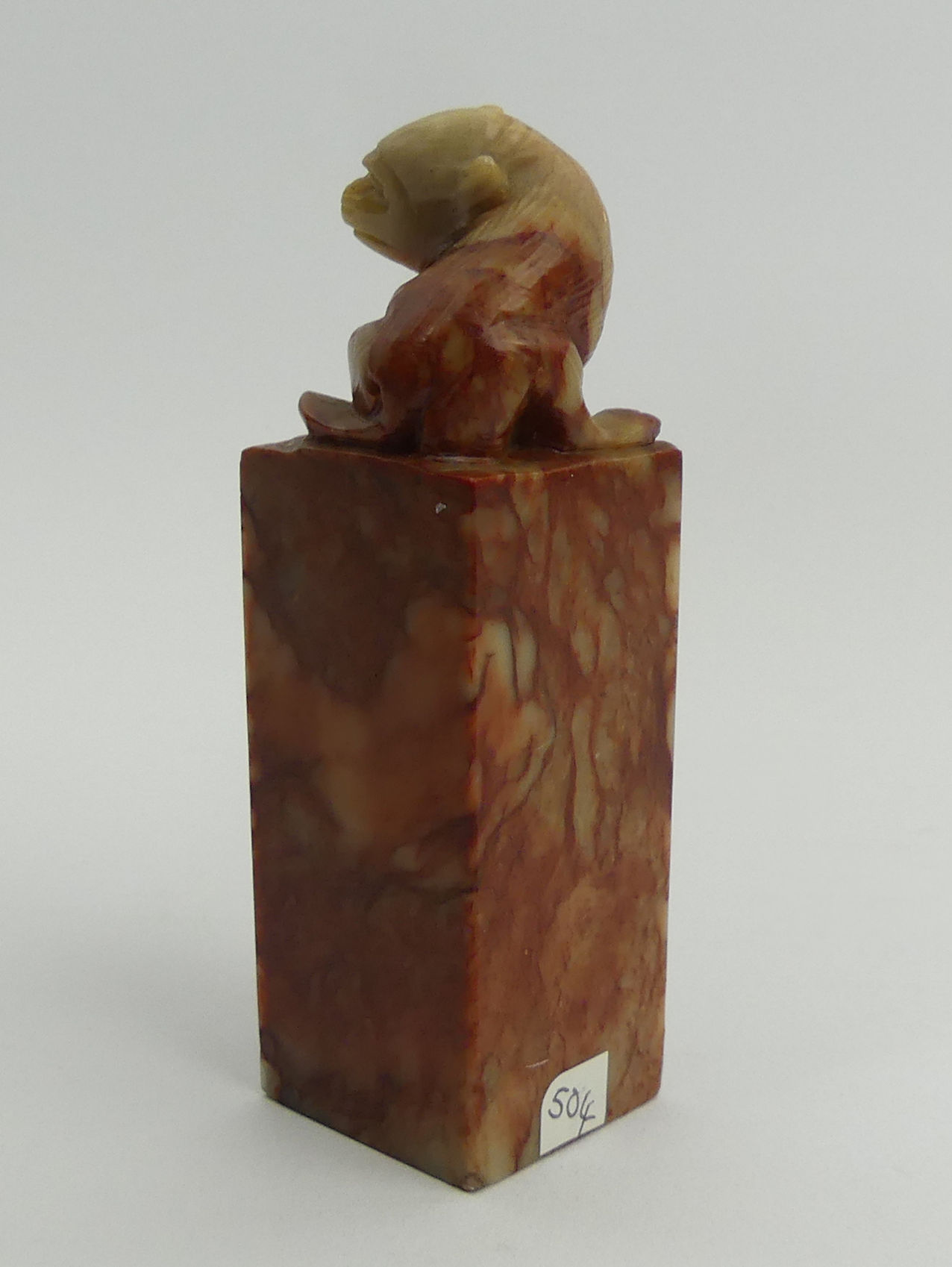 A Chinese carved soapstone seal with a monkey to the top. 9.5 cm. UK Postage £12. - Image 2 of 4