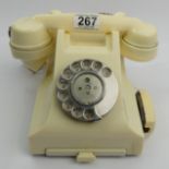 An ivory colour bakelite G.P.O telephone 332F, with a drawer. UK Postage £15.